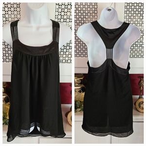 Tank top with chiffon Overlay and string straps.